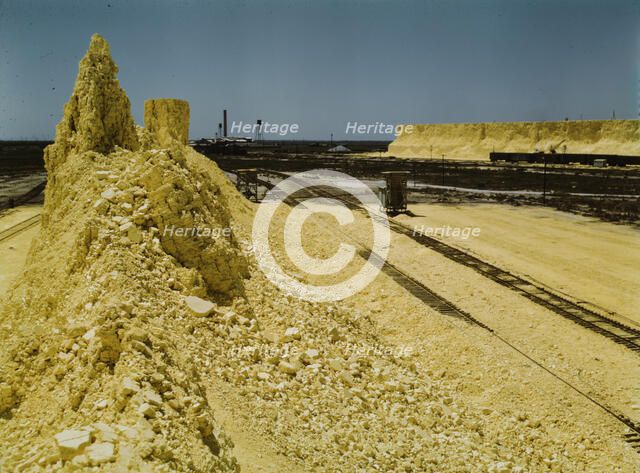 Nearly exhausted sulphur vat from which railroad..., Freeport Sulphur Co, Hoskins Mound, Texas, 1943 Creator: John Vachon.