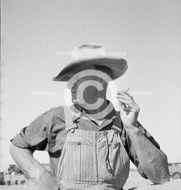 Nebraska farmer come to pick peas, near Calipatria, California, 1939. Creator: Dorothea Lange.