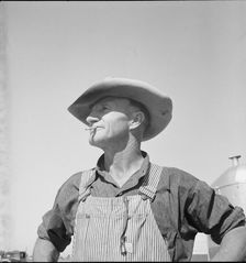 Nebraska farmer come to pick peas, Near Calipatria, California, 1939. Creator: Dorothea Lange