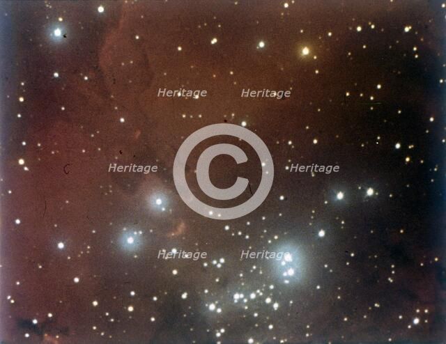 Nebulosity and star cluster in Serpens. Creator: NASA.