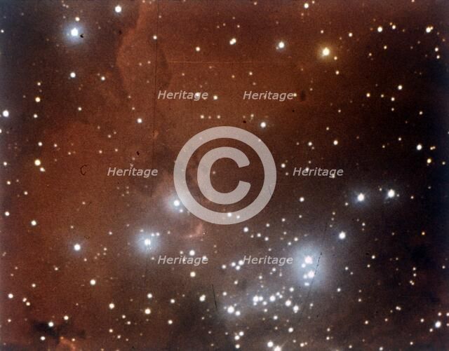 Nebulosity and star cluster in Serpens. Creator: NASA.