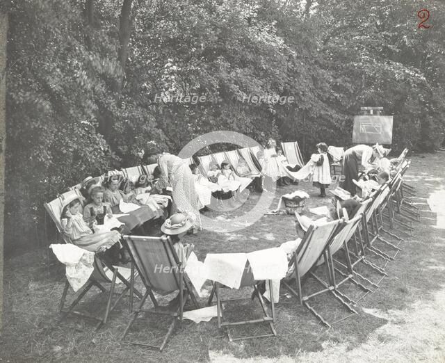 Needlework lesson, Montpelier House Open Air School, London, 1908. Artist: Unknown.
