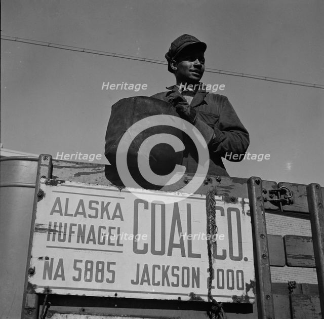 Negro coal hauler for the Alaska Hufnagel Coal Company, Washington, D.C., 1942. Creator: Gordon Parks.