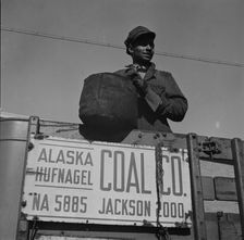 Negro coal hauler for the Alaska Hufnagel Coal Company, Washington, D.C., 1942. Creator: Gordon Parks