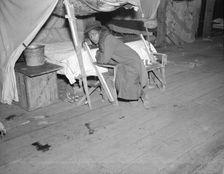 Negro girl in the temporary infirmary, Forrest City, Arkansas, 1937. Creator: Walker Evans