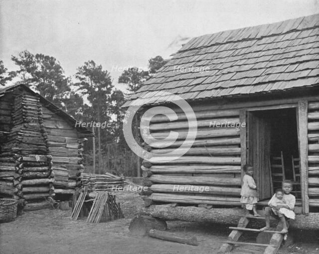 'Negro Log Huts', Thomasville, Georgia, USA, c1900. Creator: Unknown.