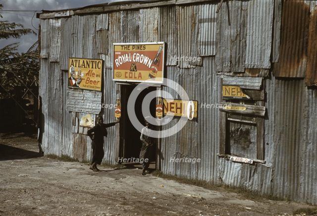 Negro migratory workers by a "juke joint" (?), Belle Glade, Fla., 1941. Creator: Marion Post Wolcott.