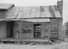 Negro sharecropper house on dirt, near Olive Hill, North Carolina, 1939. Creator: Dorothea Lange