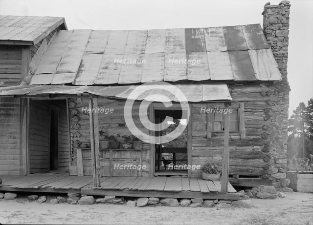 Negro sharecropper house on dirt, near Olive Hill, North Carolina, 1939. Creator: Dorothea Lange.