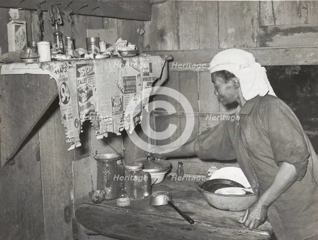 Negro tenant farmer who grew strawberries on shares near Hammond, Louisiana..., April 1939. Creators: Farm Security Administration, Russell Lee.