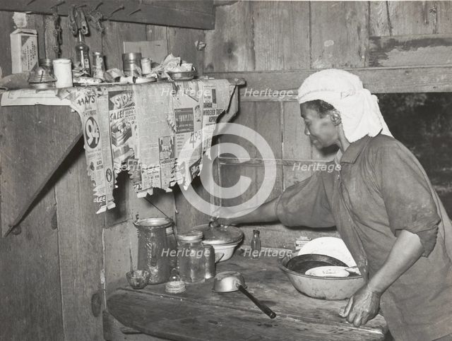 Negro tenant farmer who grew strawberries on shares near Hammond, Louisiana..., April 1939. Creators: Farm Security Administration, Russell Lee.