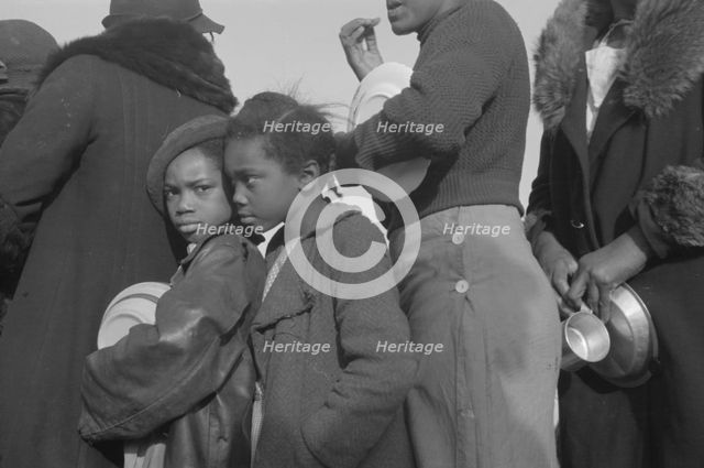 Negroes in the lineup for food at meal time at the camp for flood..., Forrest City, Arkansas, 1937. Creator: Walker Evans.