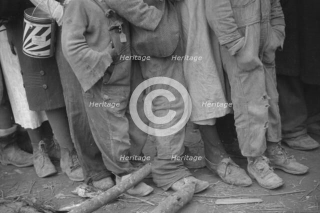 Negroes in the lineup for food at mealtime in the camp for flood..., Forrest City, Arkansas, 1937. Creator: Walker Evans.