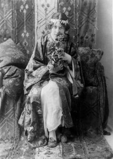 Neith Boyce Hapgood,full-length portrait, seated facing front, wearing..., between 1890 and 1910. Creator: Frances Benjamin Johnston
