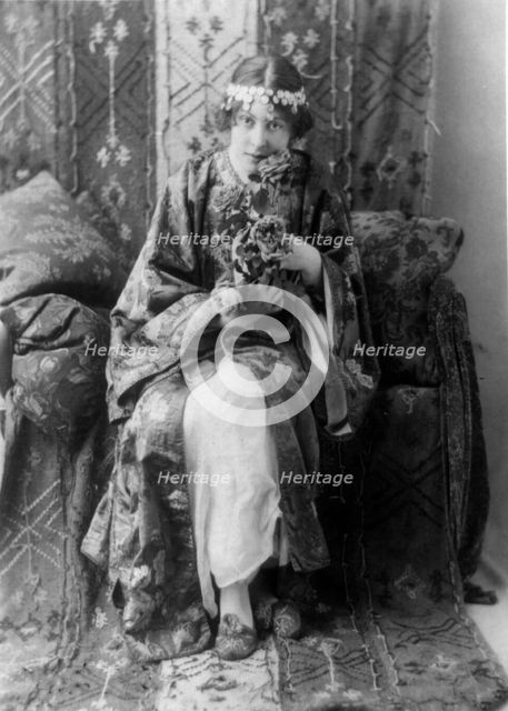 Neith Boyce Hapgood,full-length portrait, seated facing front, wearing..., between 1890 and 1910. Creator: Frances Benjamin Johnston.