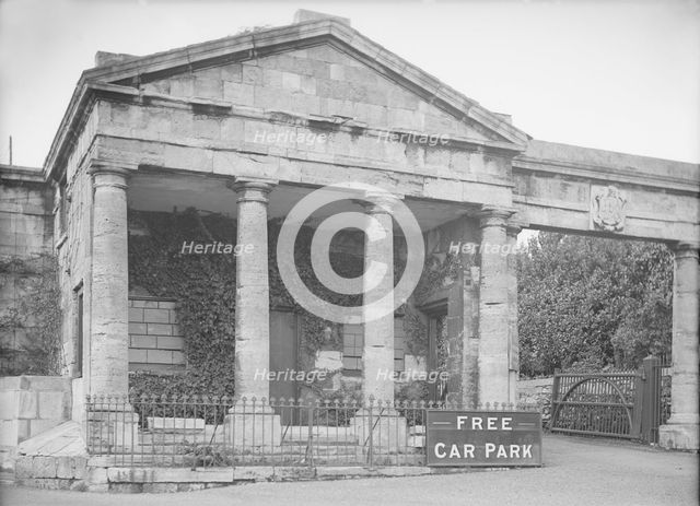 Neoclassical facade with 'Free Car Park' sign, c1935. Creator: Kirk & Sons of Cowes.