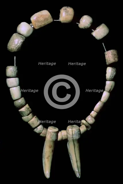 Neolithic necklace of bone and teeth. Artist: Unknown