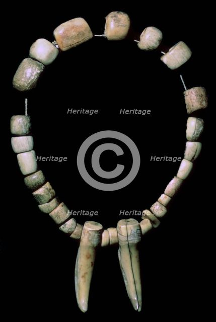 Neolithic necklace of bone and teeth. Artist: Unknown