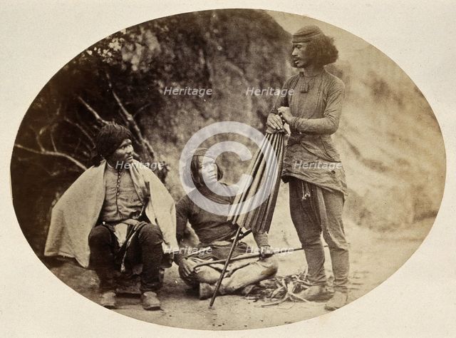 Nepal: military men: two seated, one standing, c1860. Creator: Clarence Comyn Taylor.