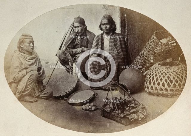 Nepal: three Newar men selling produce, seated, c1860. Creator: Clarence Comyn Taylor.