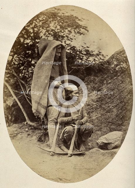 Nepal: two Tibetan men with pick-axes, c1860. Creator: Clarence Comyn Taylor.