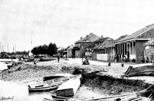 Niuchuang; our only shops, river still open, 1895. Creator: George Meisenbach