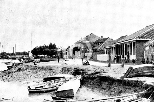 Niuchuang; our only shops, river still open, 1895. Creator: George Meisenbach.