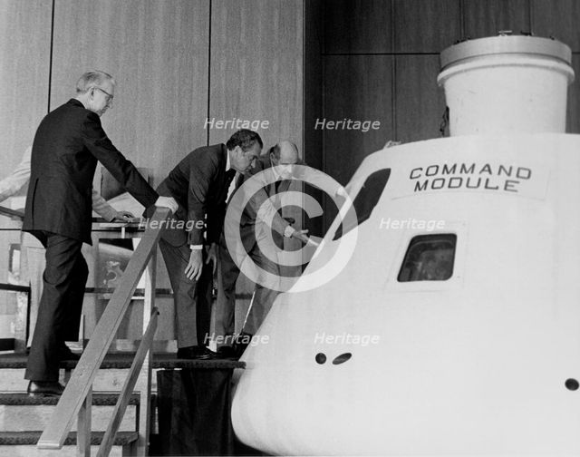Nixon given Apollo Command Module Briefing, 1974. Creator: NASA.