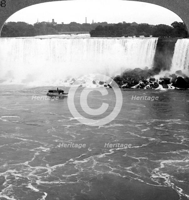 Niagara Falls and the 'Maid of the Mist', from the Canadian Cliffs, Canada.Artist: Realistic Travels Publishers