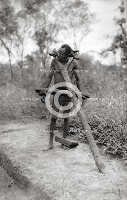 Niam Niam lunatic, Mongalla to Terrakekka, Sudan, 1925 (1927). Artist: Thomas A Glover