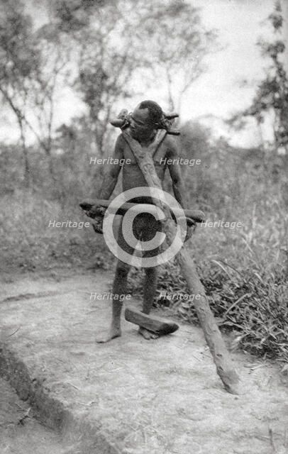 Niam Niam lunatic, Mongalla to Terrakekka, Sudan, 1925 (1927). Artist: Thomas A Glover