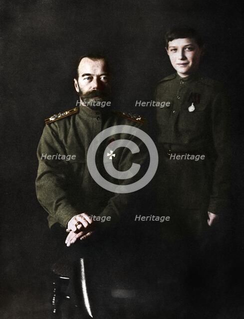 Nicholas II, Tsar of Russia and his son, Alexei, in military uniform, 1915. Artist: Unknown.