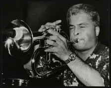 Nick Hill playing the flugelhorn at The Fairway, Welwyn Garden City, Hertfordshire, 1991. Creator: Denis Williams