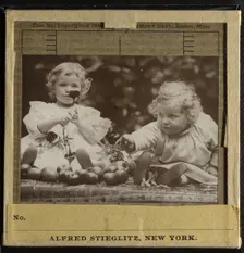 Nieces - Flora holding flower, and Hedwig, c. 1896. Creator: Alfred Stieglitz