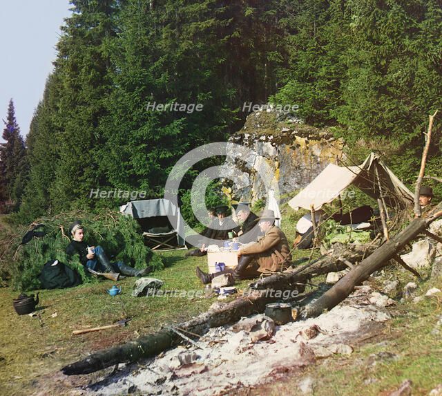 Night camp by a rock on the bank of the Chusovaya, 1912. Creator: Sergey Mikhaylovich Prokudin-Gorsky.