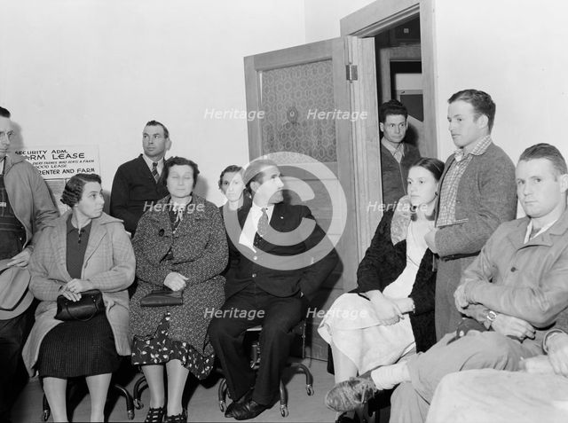 Night meeting in the FSA office, Tulare County, California, 1938. Creator: Dorothea Lange.