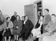 Night meeting in the FSA office, Tulare County, California, 1938. Creator: Dorothea Lange