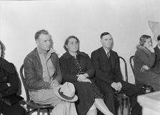 Night meeting in the FSA office, Tulare County, California, 1938. Creator: Dorothea Lange