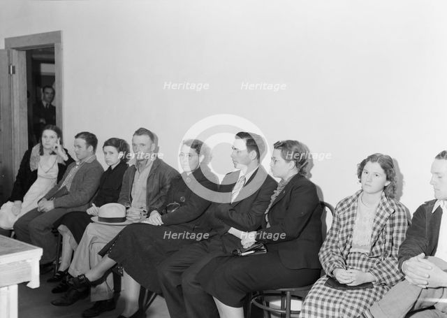 Night meeting in the FSA office, Tulare County, California, 1938. Creator: Dorothea Lange.