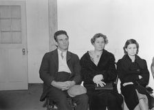 Night meeting in the FSA office, Tulare County, California, 1938. Creator: Dorothea Lange