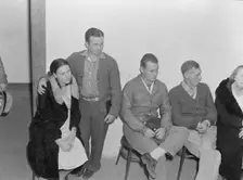 Night meeting in the FSA office, Visalia, Tulare County, California, 1938. Creator: Dorothea Lange
