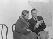 Night meeting in the FSA office, Visalia, Tulare County, California, 1938. Creator: Dorothea Lange