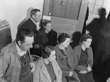 Night meeting in the FSA office, Visalia, Tulare County, California, 1938. Creator: Dorothea Lange