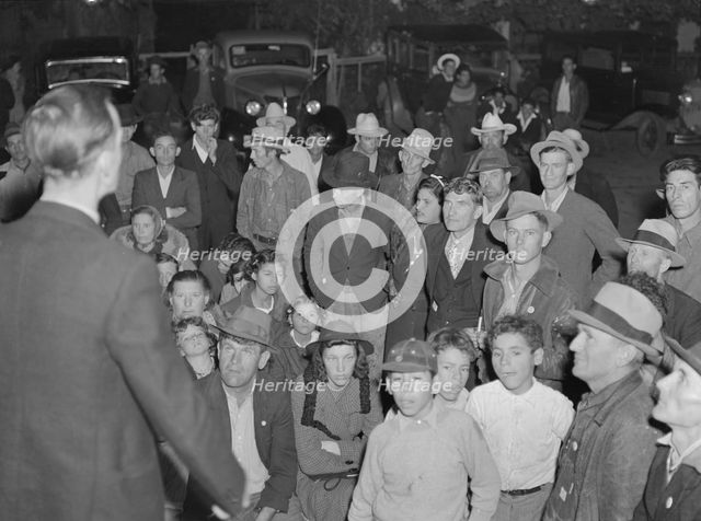 Night street meeting of cotton strikers near end of defeated strike. Kern County, California, 1939. Creator: Dorothea Lange.