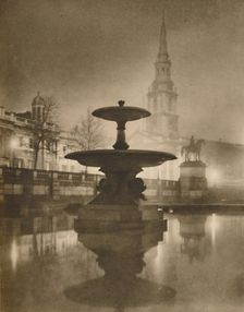 Night Rain Has Turned The Pavements To A Pool of Reflections c1935. Creator: Calkin