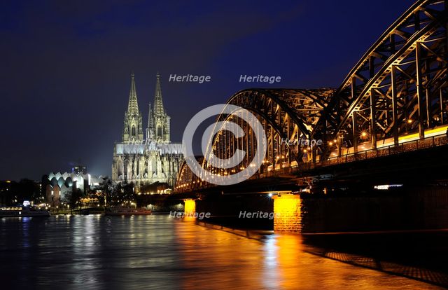 Night view of the Hohenzollern Bridge over the Rhine, Cologne, Germany, 2018. Creator: LTL.