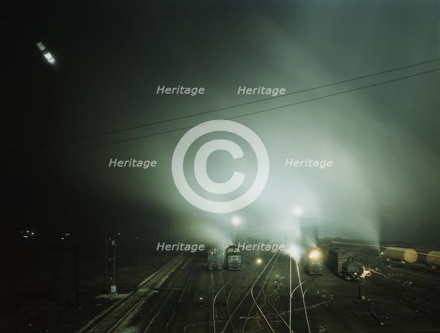 Night view of part of Santa Fe R.R. yard, Kansas City, Kansas, 1943. Creator: Jack Delano.