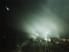 Night view of part of Santa Fe R.R. yard, Kansas City, Kansas, 1943. Creator: Jack Delano