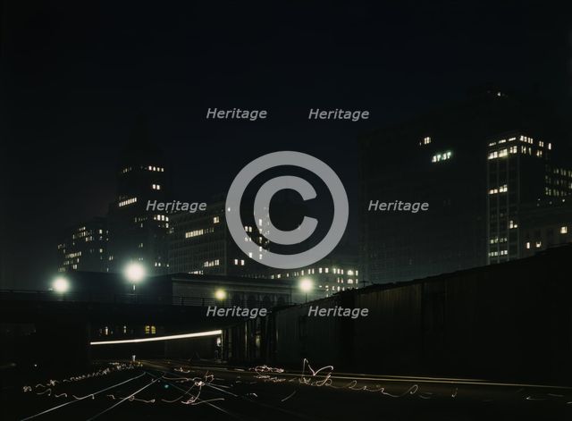 Night view of part of the South Water street freight terminal...Illinois Central R.R., Chicago, 1943 Creator: Jack Delano.