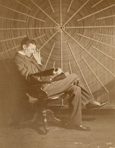 Nikola Tesla and his spiral oscillating transformer, 1896. Creator: Anonymous